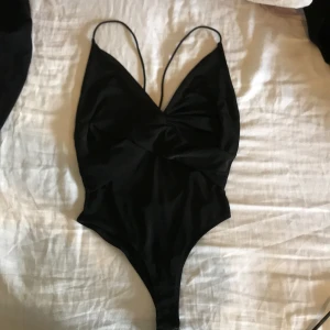 Body - Body med skiiiitsnygg rygg! Säljer pga för liten för mig. Passar XS