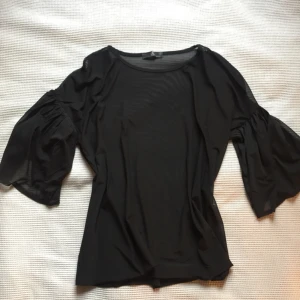  - topp i stretchig mesh från missguided