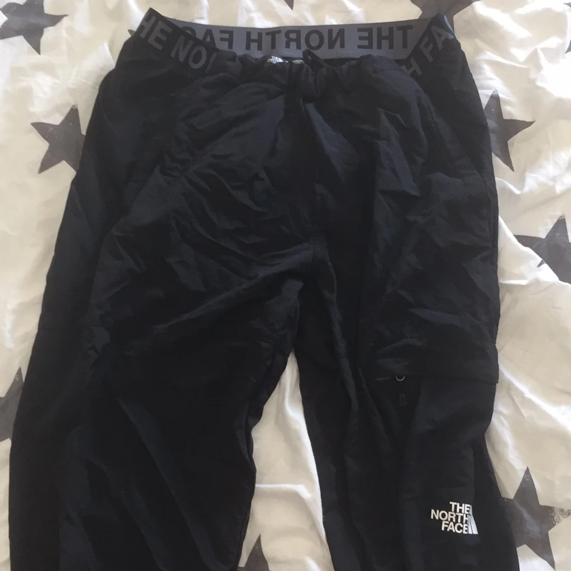 North face vindbyxor raka