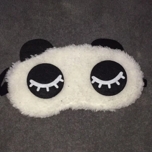 Sovmask - En panda sovmask från H&M