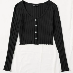 Topp - Storlek xs ser exakt ut som på bilden med bra passform säljs pga att jag köpte fler storlekar 