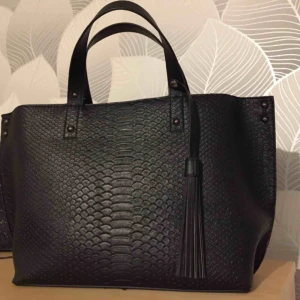  - Fin oanvänd väska