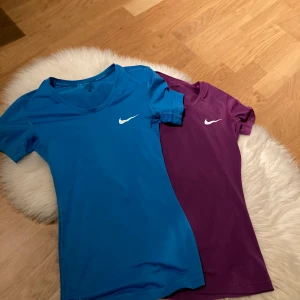 Nike tröjor - Två Nike träningströjor, lila i 36 och blå i 34💃🏼  1 för 60 och båda för 100kr