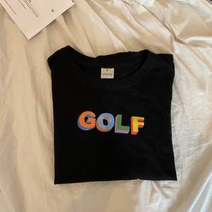En t shirt inspirerad av Golf. Inte äkta, är aldrig använd. Storlek S. Köparen står för frakten 