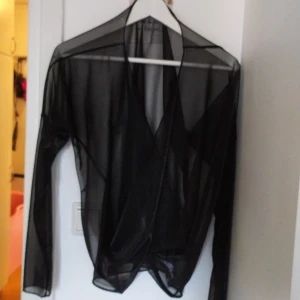 Omlott topp One size - Skimrigt tyg som är supersnygg med typ ett linne under.