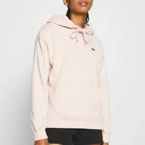 Rosa levis hoodie, fint skicka använt få gånger bara 