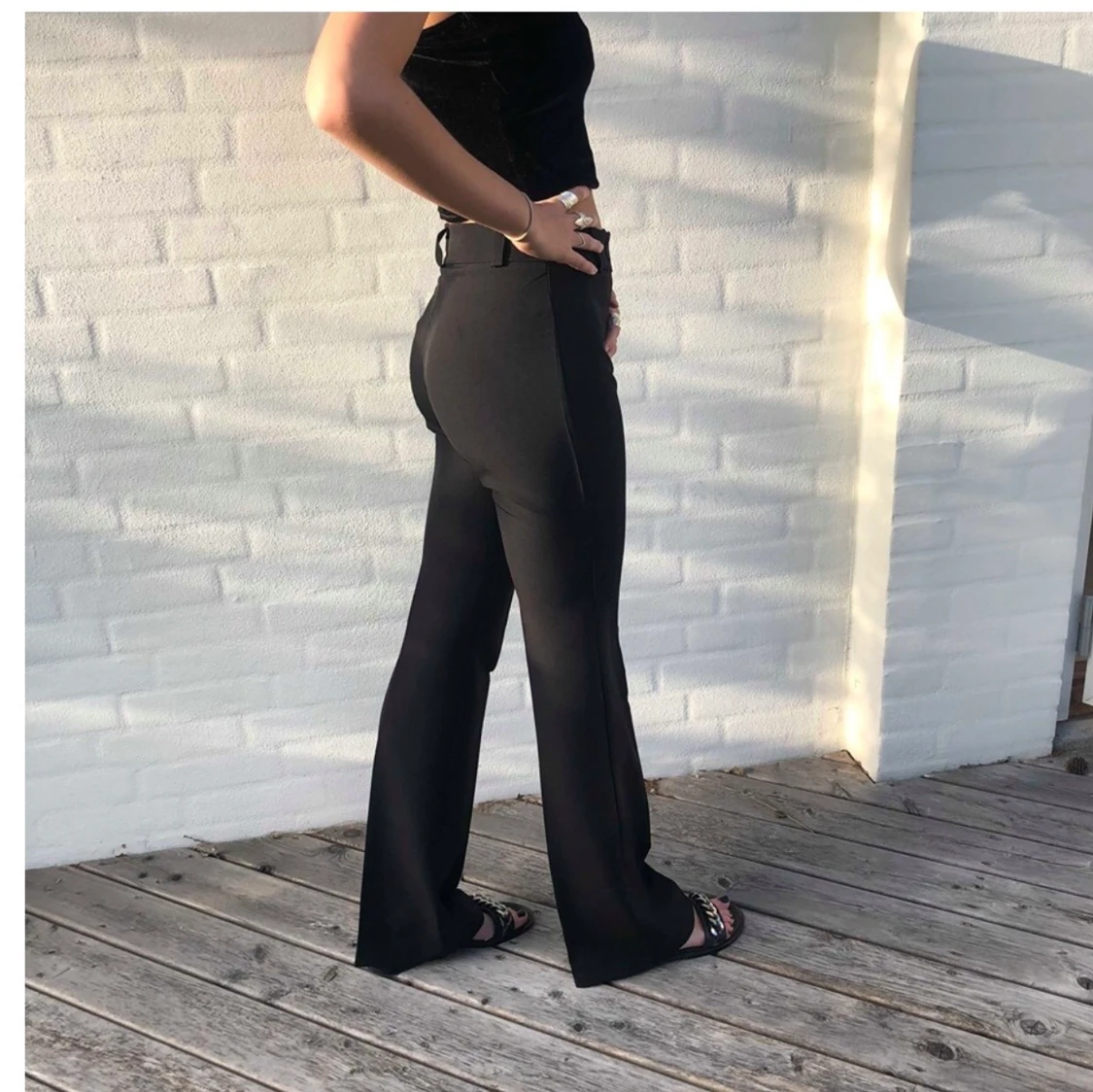 Utvsvängda kostymbyxor