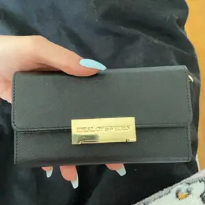 Ett plånboks skal till iPhone xs, aldrig använd! Frakt ingår