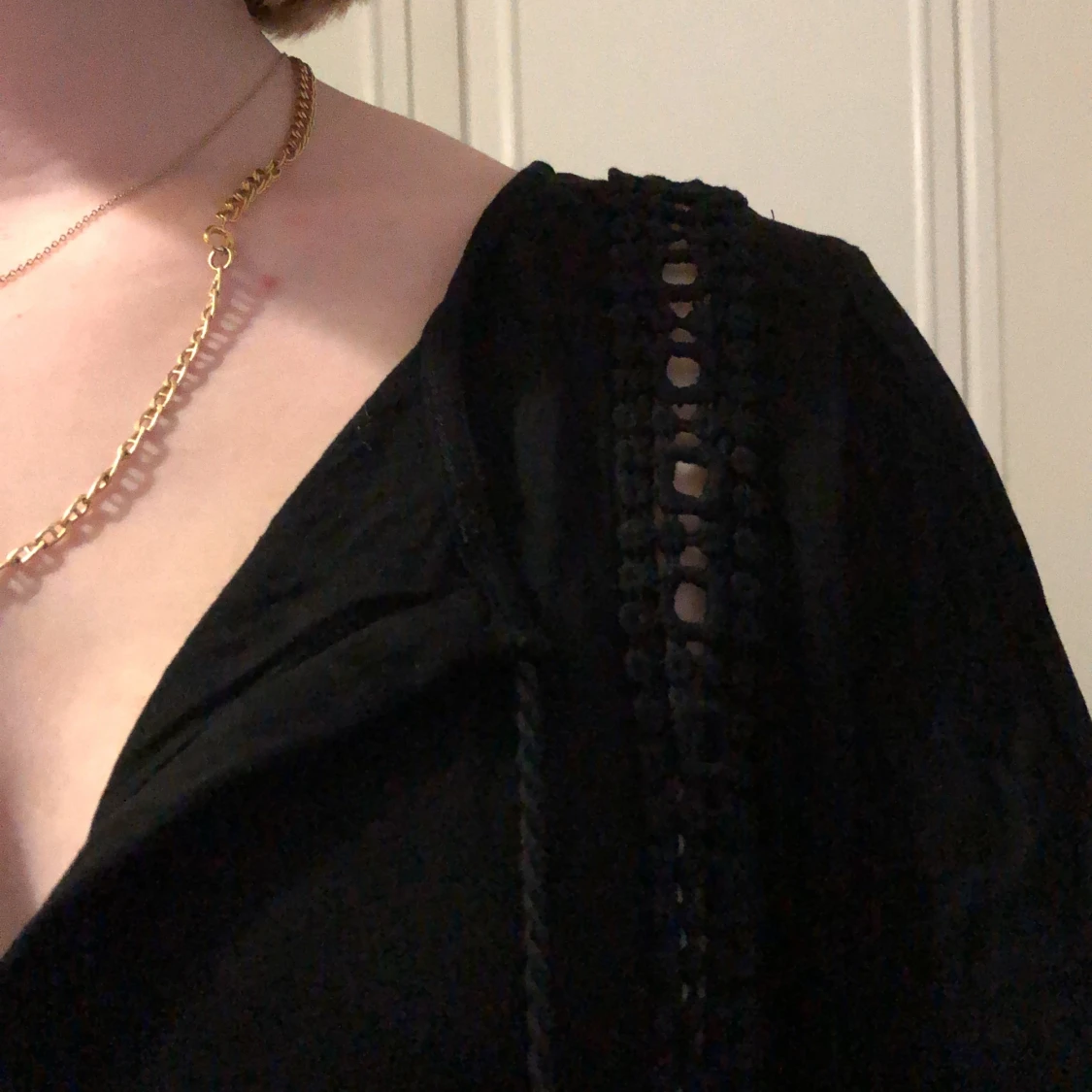 En svart tunikaklänning - 90