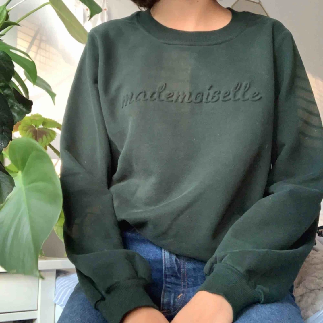 mörkgrön sweatshirt