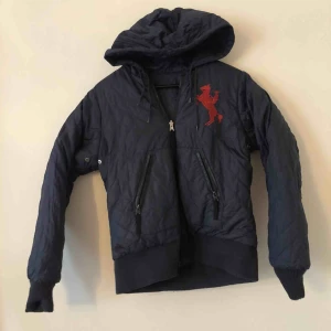  - Bondelid Navy Blue reversible jacket. Size 32  Excellent condition 