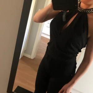 Topp - En fin body ifrån Nelly! Storlek s 