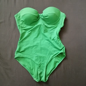 Oysho swim suit size S - Green swim suit size S from previous years. Worn for one summer. In good condition. Stripe is lost. 