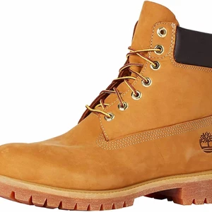 Kängor  - timberland kängor i gul/orange/brun färg använda max 5 gånger 