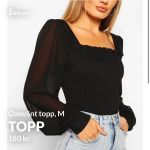 Topp - En oanvänd topp i storlek M