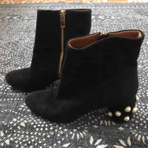  - Suede ankle boots with pearly heels. Have been worn just a handful of times. In good condition. 