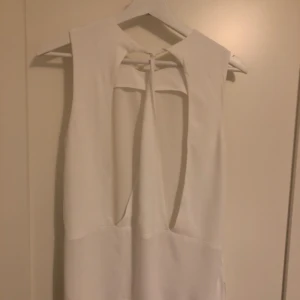  - White elegant backless top