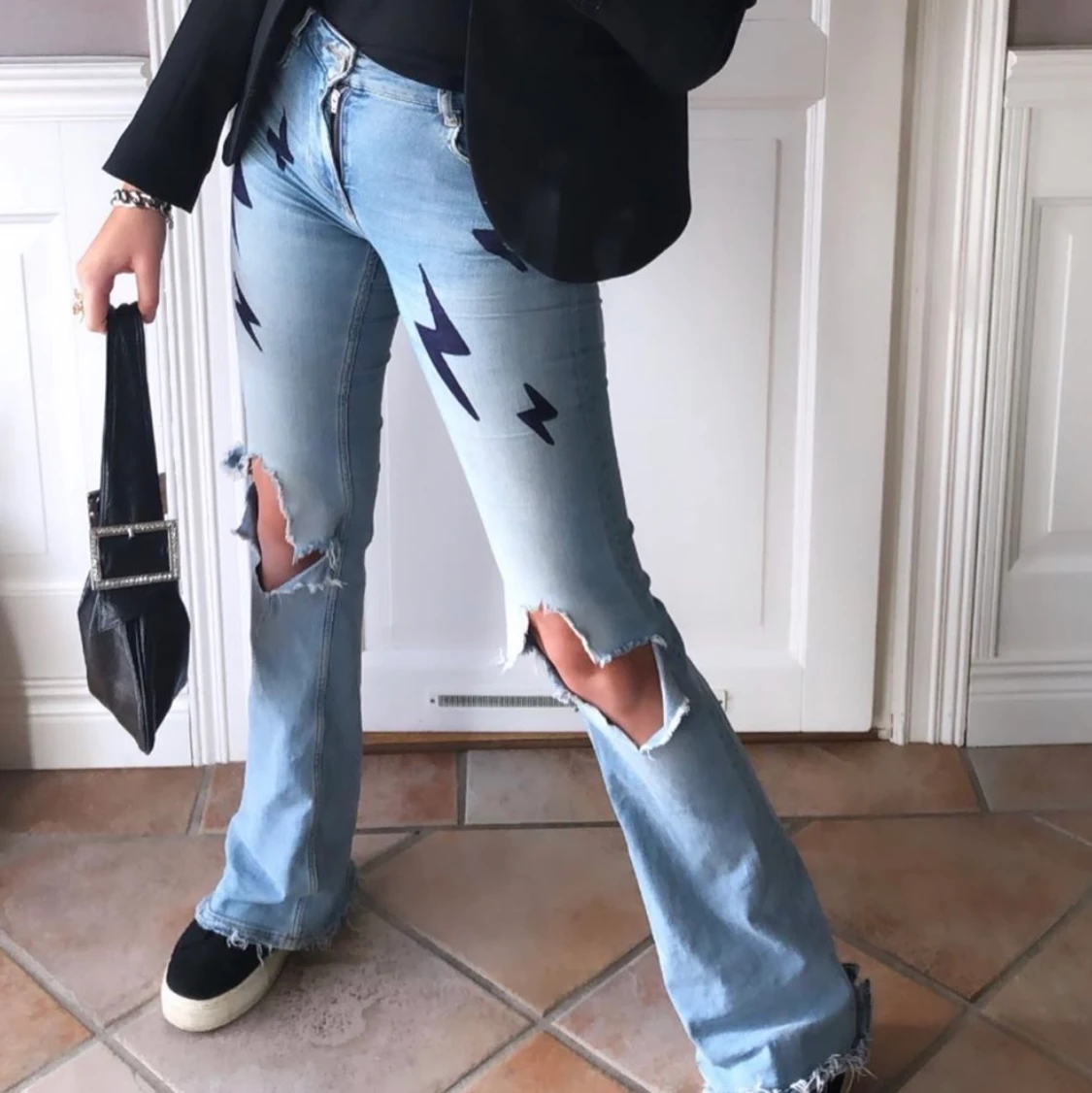 Bootcut jeans med blixtrar