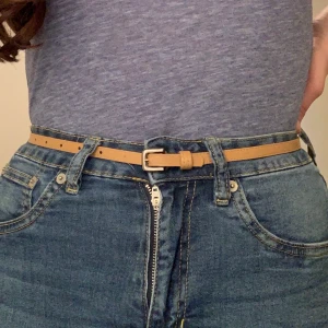 Skärp - Ett snyggt lätt skärp som inte kommit till användning. FRI FRAKT