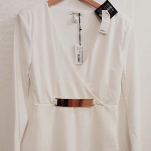 Klänning st L - Supersnygg klänning från Nelly. Endast testad. 