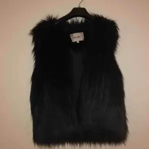 Fake fur vest. Perfect condition! 