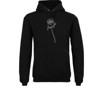 The cool elephant hoodie - En svart hoodie men en vit ros på från The cool elephant som nästan aldrig blivit använd