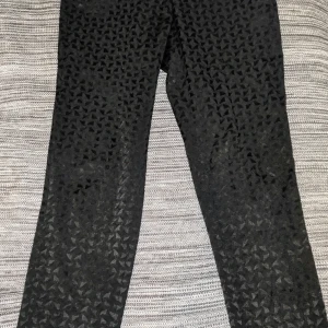 Stockh LM mq - Svarta men mönstring, normalmidja, kort slits i nedre kanten 