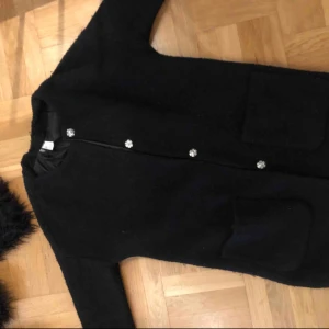  - Jacka/kappa i bra skick! Det är storlek 34 men passar även någon som har storlek 36/38! 