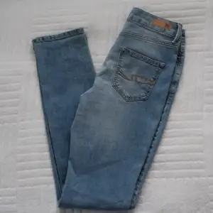 Light blue jeans - 99% cotton, 1% spandex - unused - tall fit - high waist