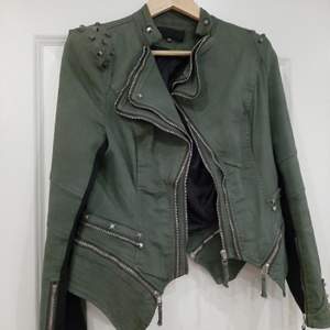 Great jacket with silver details and zips 