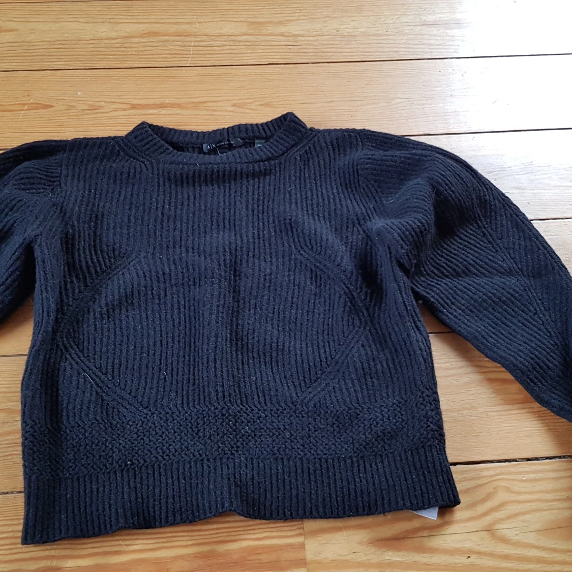Svart Armani Exchange tröja. 