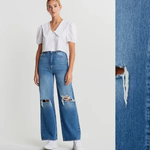 Raka vida jeans från Gina tricot - Helt nya (prislapp kvar) raka vida jeans med slitning på knäna. Jeansen är slutsålda på Gina tricots hemsida. Om flera är intresserade är det budning som gäller. Storleken motsvarar en xs.