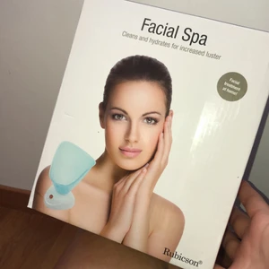 Facial spa - En maskin som man fyller med vatten som sedan omvandlas till ånga. Du lägger ansintet mot det blåa och får ånga på hela ansiktet som öppnar dina porer. Andvänt ett par gånger men den är i bra skick!