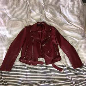 Red leather jacket from Zara’s last fall collection. Used several times 