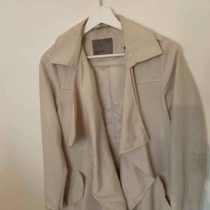  - Beige kappa från vero Moda 