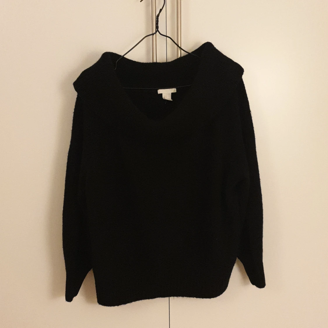 Svart stickad tröja