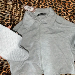 Dubble zip tröja  - Aldrig använd,endast testad.Stl L (liten xl)