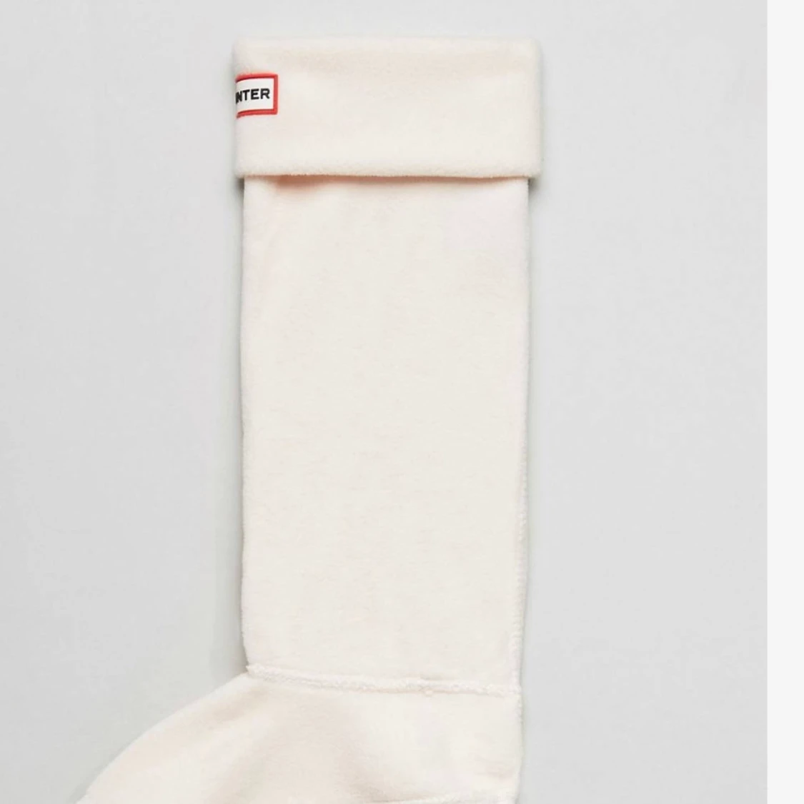 Hunters bootstrumpor i gräddvit färg