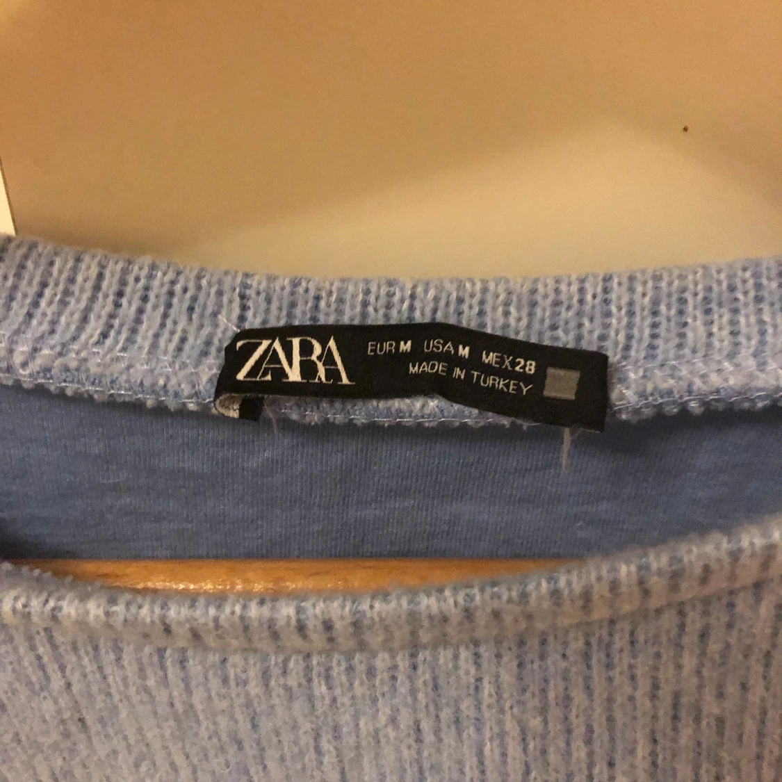 Ljusblå tröja - 90