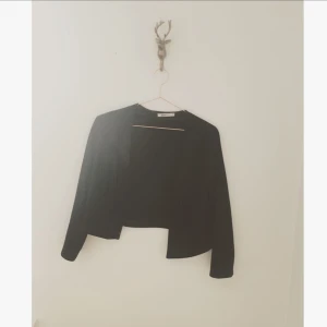  - Mocca fransjacka från Gina tricot