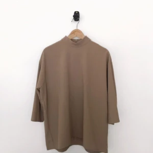  - High neck oversized nude top from Monki. Favorite that doesn’t fit as well as it used to 💔 