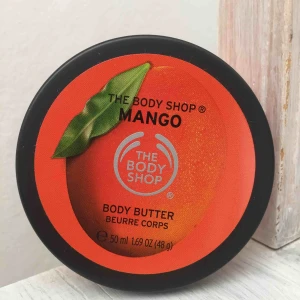  - bodybutter med doft av Mango från the body shop. ALDRIG använd, inte ens testad, helt ny. säljer pga kommer inte till användning. frakt tillkommer