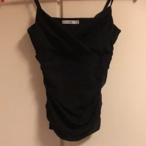 Topp - Fin liten topp i fint skick, 