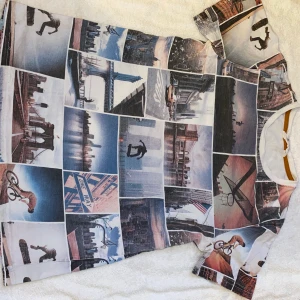 H&M tshirt stl 158/164 - Snygg tshirt med fina bilder tryckta på. En aning solblekt. Fint skick!