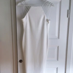  - Superfin tajt klänning ca till knäna. Aldrig använd pga tänkt till studenten men hittade en annan. Från Top Shop!