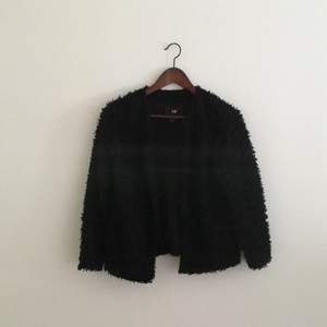 Black shaggy jacket. Good condition. 