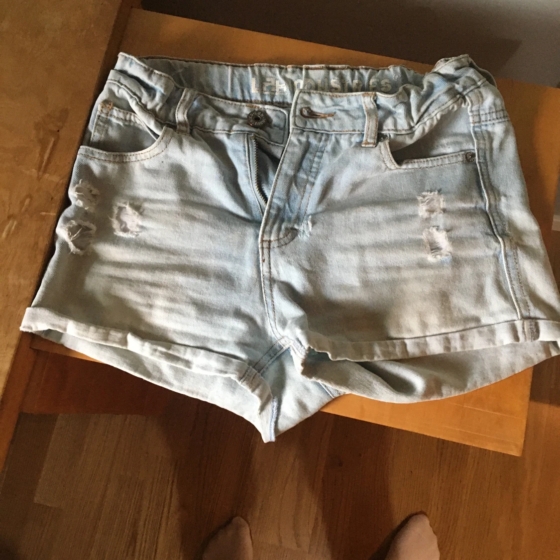 Ljusblå shorts - 90