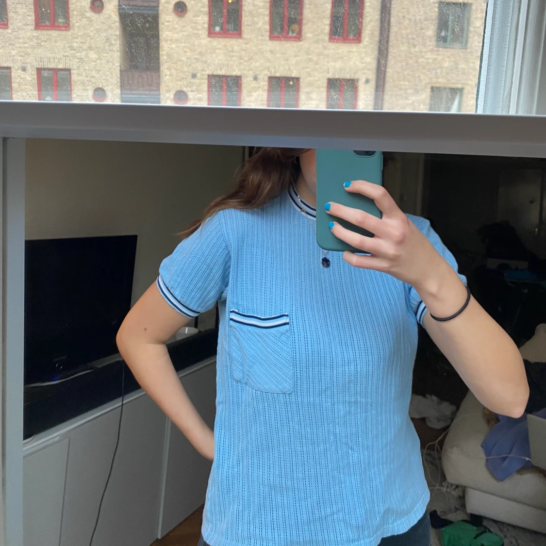 Trendig blå 90s T-shirt