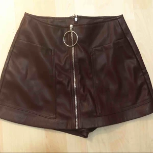  - Maroon leather skirt/shorts 