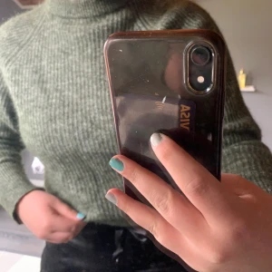 Grön stickad tröja - Stickad tröja från Nakd, strl s men är ganska liten i storleken, i nyskick